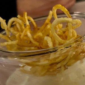 Patatas paja  at MUDRA Plant Based  in Madrid