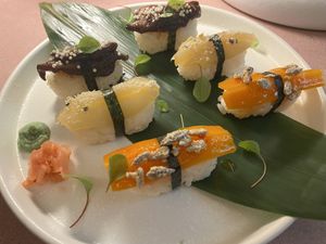 Mixed nigiris (roasted caramelized carrot, pears au vin and hoisin shiitake)   at MUDRA Plant Based  in Madrid