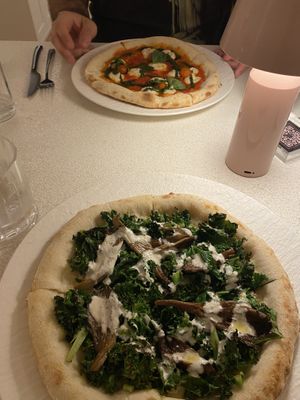 Truffle and margarita pizza  at MUDRA Plant Based  in Madrid