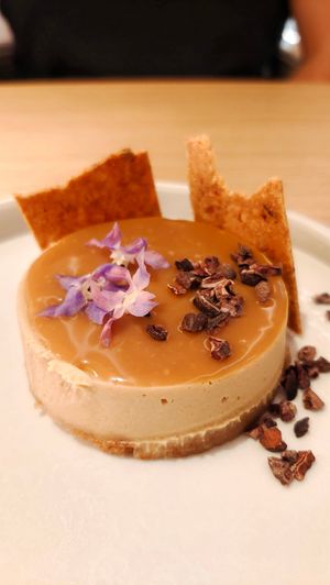 Cheesecake con dulce de leche de coco. Muy rico at MUDRA Plant Based  in Madrid