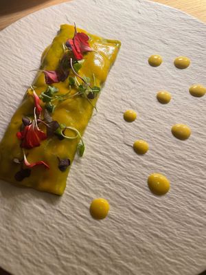 Spinach canneloni with Tikka Masala spiced filling - NO MAIN DISH SHOULD BE 3 BITES! at MUDRA Plant Based  in Madrid