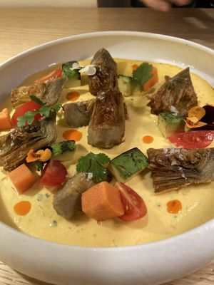 Tiradito de alcachofas  at MUDRA Plant Based  in Madrid