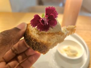 Complimentary bread and butter! at MUDRA Plant Based  in Madrid