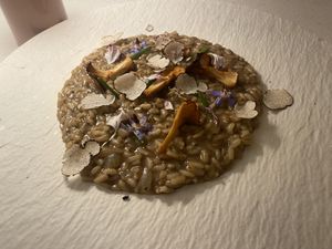 Risotto funghi y tartufo  at MUDRA Plant Based  in Madrid