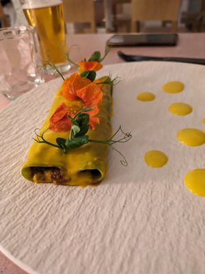 Curried canneloni at MUDRA Plant Based  in Madrid