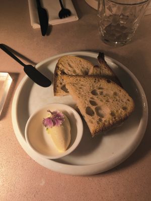 Bread and butter at MUDRA Plant Based  in Madrid