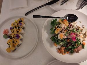 Amazonia rolls and Kale salad half eaten already at MUDRA Plant Based  in Madrid