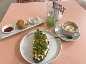 Brunch: Sourdough Bread + Scone + Decaf latté + Cucumber drink   at MUDRA Plant Based  in Madrid