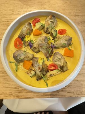 Artichokes with sweet potatoes   at MUDRA Plant Based  in Madrid