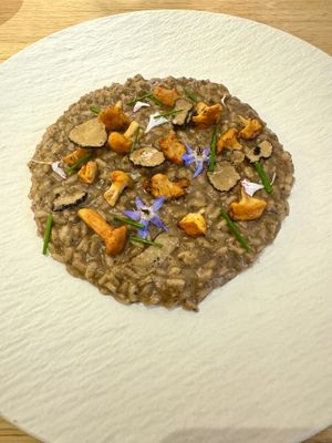 Chanterelle mushroom and truffle risotto   at MUDRA Plant Based  in Madrid