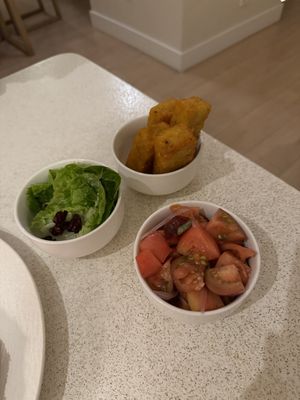 Schnitzel sides  at MUDRA Plant Based  in Madrid