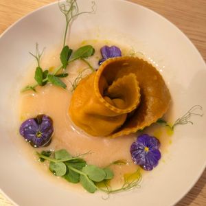 Almond ricotta pasta, dried filling at MUDRA Plant Based  in Madrid