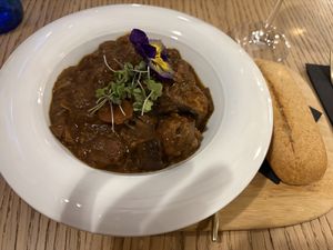 Bourguignon. The meatballs in it tasted very processed. Probably shop bought.   at Amberes The Vegetarian Wine And Cocktail Bar in Valencia