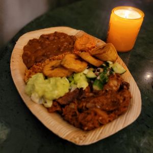 Ndambé Mix from @_jefjel_. 
Senegalese beanstew with pulled jackfruit, fresh guacamole, fried plantains, salad & bulgur. at Fulani - Afro Caribbean Street Food in Oslo
