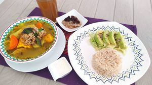 Super delicious "ajiaco"with rice, fresh salad, açaí juice or guarapo and guava desert. a MUST!! at Las Veganas in Medellin