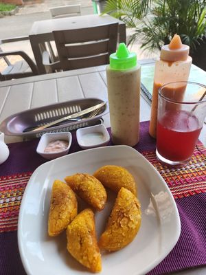 empanadas de papas con todas las salsas at Las Veganas in Medellin