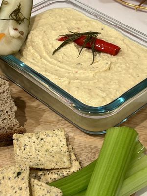 Extra spicy pickle hummus from scratch, Jalapeño pulp chips, and buckwheat bread  at Ethikli in Long Beach