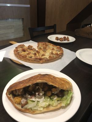 L-R. Super pitta, meat feast pizza and chicken skewers.  at Veggie Lounge in Wolverhampton