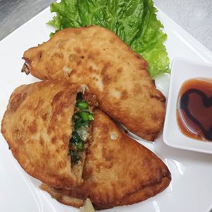 Fried Leek Dumplings at Loving Hut in Douala