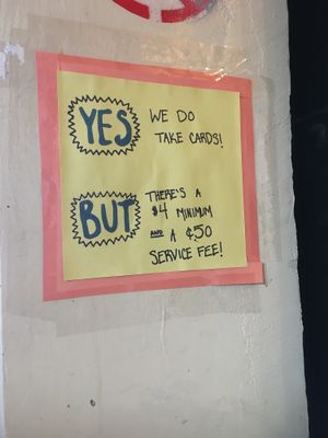 Service fee and minimum charge for credit cards at Cinnamon Works in Seattle