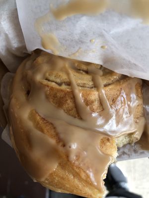 Vegan cinnamon roll with maple frosting  at Cinnamon Works in Seattle