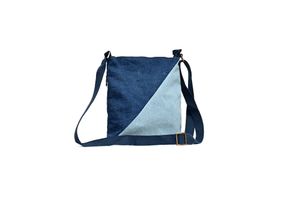 Up-cycled denim cross body bag. Incredibly useful for those on the run and want to leave their hands free. A must have in any wardrobe. at Karuna Dawn in Melbourne