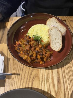 Chilli con carne with saffron rice and plain bread  at The Good Home in Christchurch