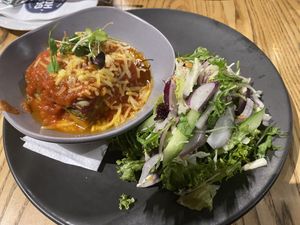 Lasagne and salad  at The Good Home in Christchurch