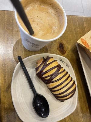 Iced vegan milk coffee and a chocolate pasty  at Chay 365  in Ho Chi Minh City