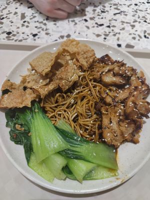 Noodles with faux meat and pak choi at Nyonya Vege in Kuala Lumpur