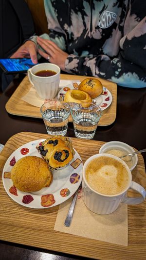 Melonpan, Anman, something with raisins and something with apples. Cafe latte and tea. at Nana Kitchen - ななキッチン in Tokyo