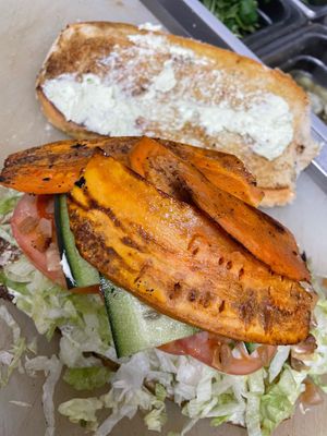 Veggie on a tort bread-
Jalapeño cream cheese
Sweet potato 
Lettuce
Tomato 
Avocado 
 Cucumber  at TKO Deli in San Diego