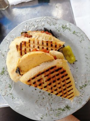 Vegan coconut cutlet panini with grilled portobello mushroom and vegan mozzerella at Lemoni Cafe in Miami