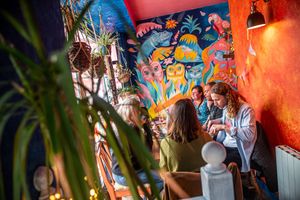 Guests dining upstairs at Kanu Poké in Shrewsbury