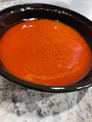 Spicy red sauce   at African Palace in Florissant