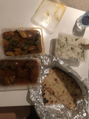 Eggplant curry, Veg Manchuria, Kashmiri Naan, Coconut rice, Pappadums.   at Veg & Vegan Indian Cuisine in Para Vista