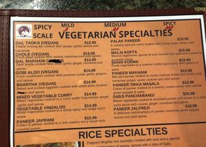 A couple changes to the menu that the owner totally helped out with.   The Dal Makhina is not vegan.  And the Bhartha does not contain cheese even though it says it does    at Taj Mahal Fine Indian Cuisine  in Rochester