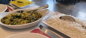 Large portion Saag Daal and plain boiled rice at Taj Mahal Fine Indian Cuisine  in Rochester