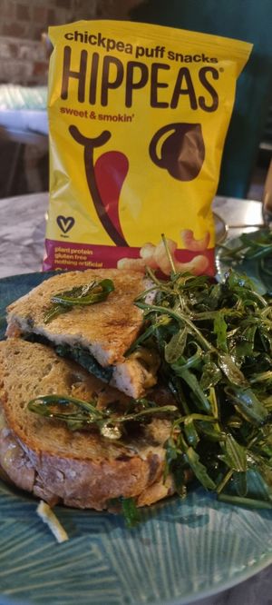 Spinach and pesto grilled cheese sandwich with crisps at Grind House Bawtry in Doncaster