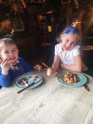 Kids enjoying a stack of biscotti pancakes and vegan Nutella and squiry cream (personal request) at Grind House Bawtry in Doncaster