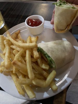 Buffalo Caesar wrap with fries  at Jordan's Homeside Pub in Hamilton