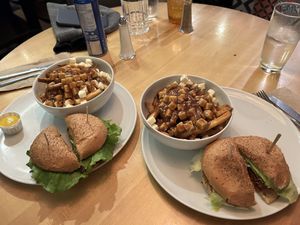 Mushroom burger with poutine and vegetator with poutine   at Chez Victor - St Jean in Quebec