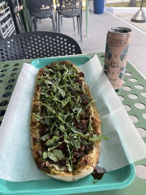 Sausage pesto pizza  at Florish in Tampa