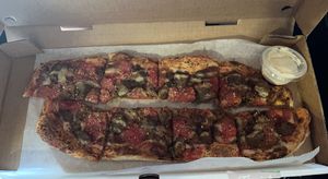 Meat lovers pizza with ranch on the side   at Florish in Tampa