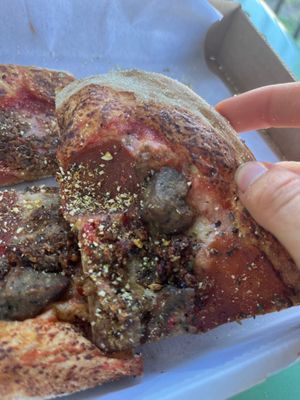 Slice of the “meat lovers”  at Florish in Tampa