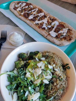 Sun Goddess bowl with custom sausage cashew cream pizza at Florish in Tampa