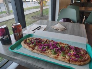 Build your own, pickled cabbage, pesto drizzle, pineapple, artichoke, mushroom, pepperoni. at Florish in Tampa