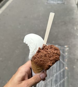 Dark chocolate 100% and Limone ice cream in vegan cone  at Artico Gelateria in Milan
