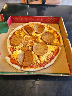 Pepperoni pizza at Granada Vegan Kitchen in Ensenada