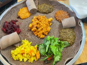 Combo with a tofu dish in the middle  at Abol Africa in Footscray